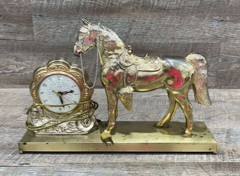 Vintage metal horse clocknon working Schneider Auctioneers LLC