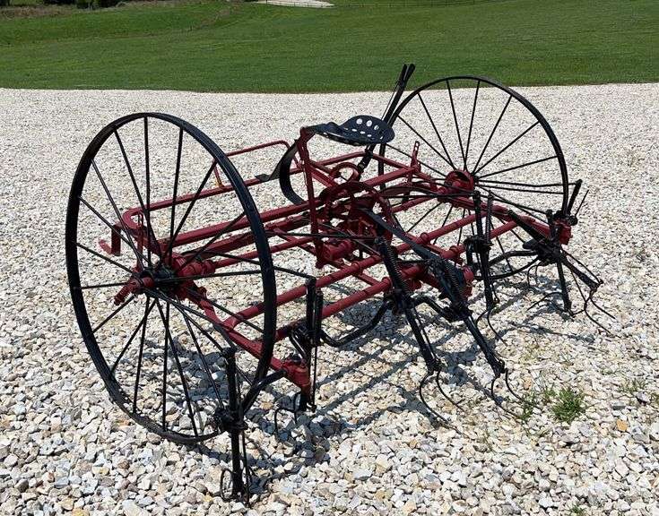 Antique International horse drawn hay tedder Schneider Auctioneers LLC