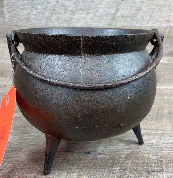 Cast iron bean pot, 7” tall Schneider Auctioneers LLC