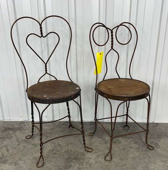 2 antique metal ice cream chairs Schneider Auctioneers LLC
