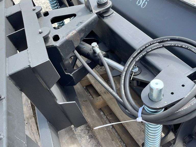 Unused Uppro 86" skid steer snow plow Schneider Auctioneers LLC