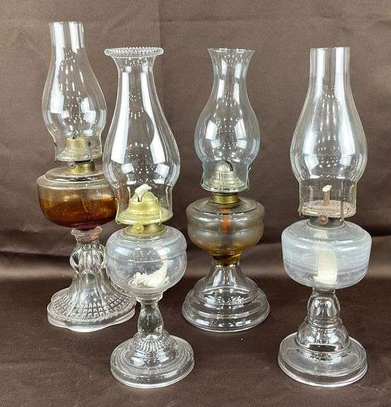 4antique oil lamps Schneider Auctioneers LLC