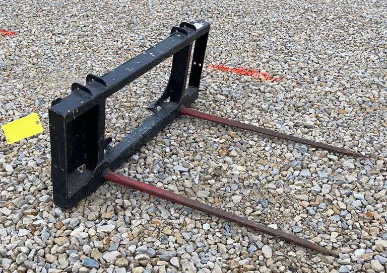 HLA skid steer quick attach bale spear Schneider Auctioneers LLC