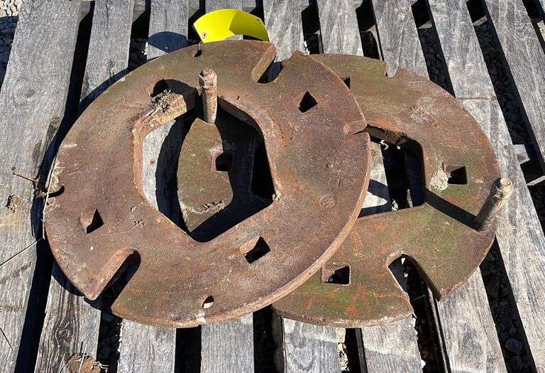 Pair of International rear wheel weights Schneider Auctioneers LLC