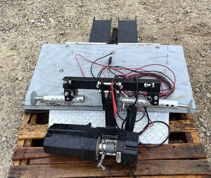 Receiver hitch mounted winch powered lift platform Schneider