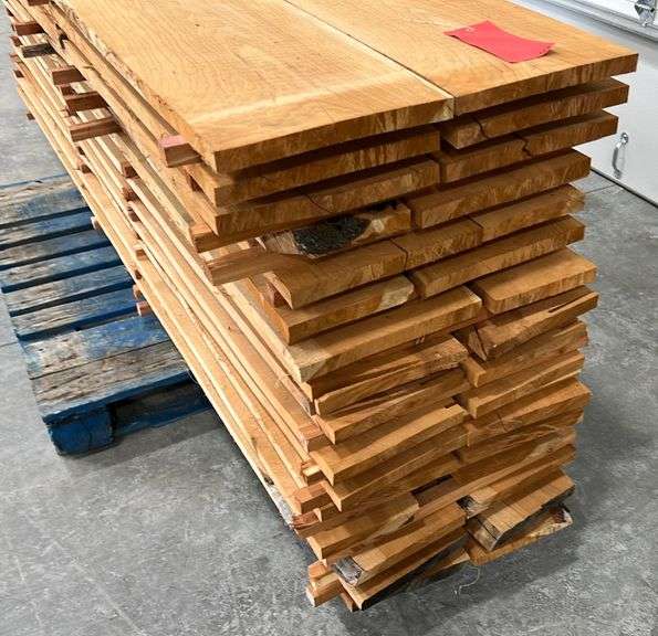 Group of rough cut cherry 1"x lumber Schneider Auctioneers LLC