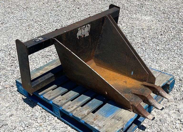 Skid steer stump bucket Schneider Auctioneers LLC