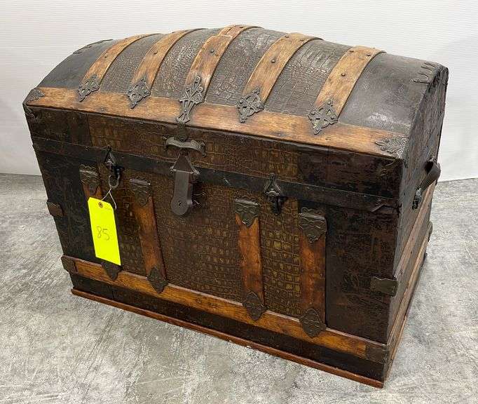 Antique camelback trunk Schneider Auctioneers LLC