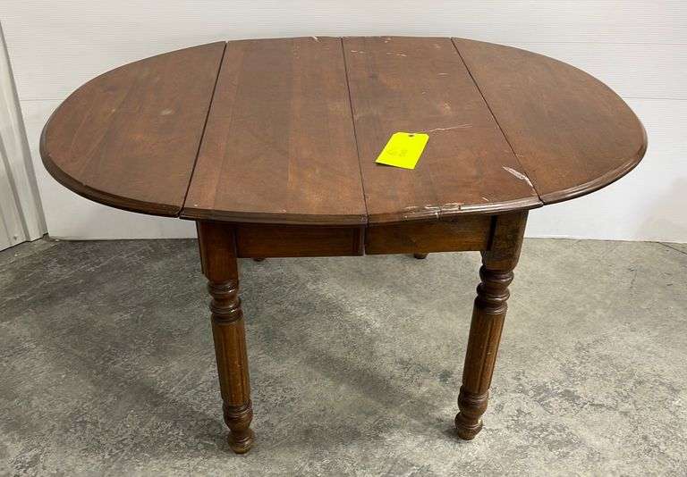 Antique walnut drop leaf table Schneider Auctioneers LLC