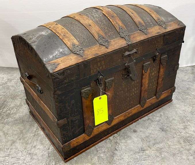 Antique camelback trunk Schneider Auctioneers LLC