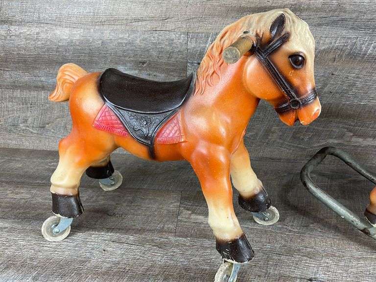 Vintage plastic rolling & rocking horses Schneider Auctioneers LLC