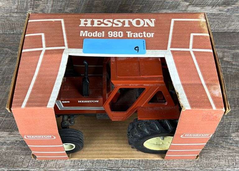 1/16 Ertl Hesston 980 tractor Schneider Auctioneers LLC