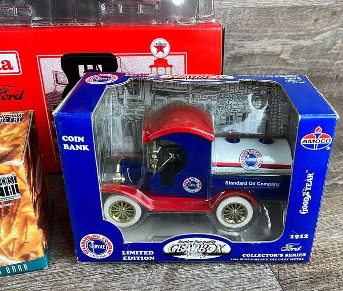 Group of toy banks & trucks Schneider Auctioneers LLC