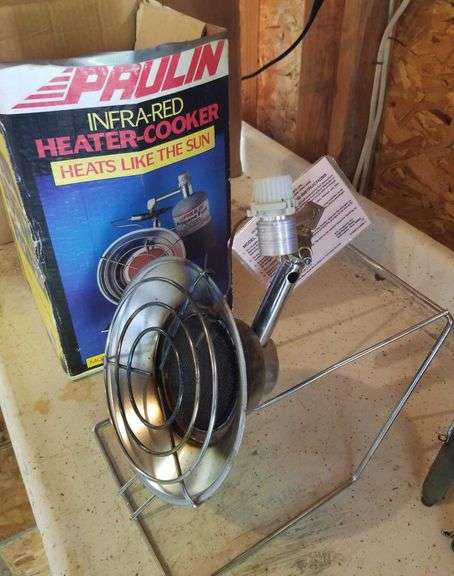 Paulin heater, two rods in holder. - Sherwood Auctions