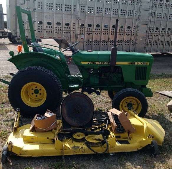 Weekly Online Auction 850 John Deere, Pontiac G6, Rockwell Camper, Bud