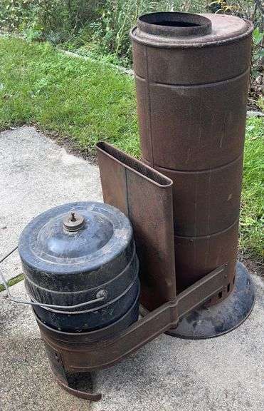 Coleman Oil Burning Heater model # 333A, 32” tall u0026 24”x13” - Sherwood  Auctions