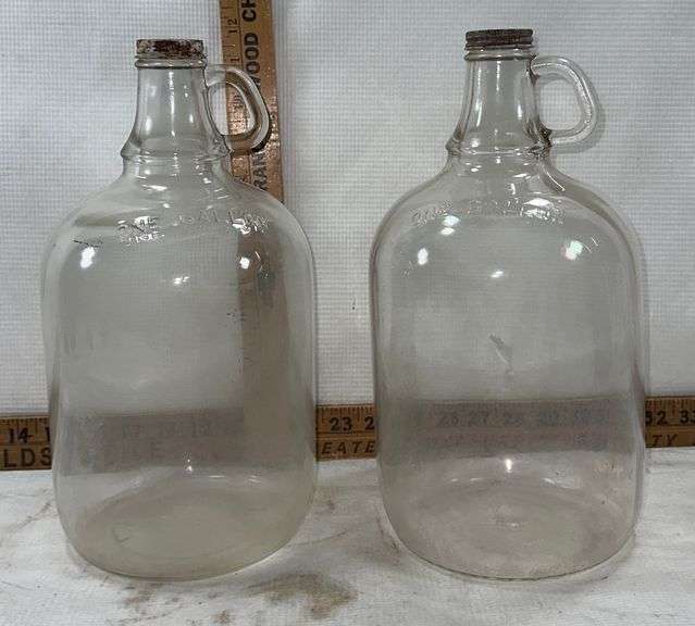 2 One Gallon Glass Jugs Sherwood Auctions