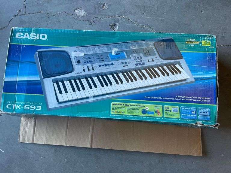 Casio Electronic Keyboard (Model CTK593) Sierra Auction Management Inc