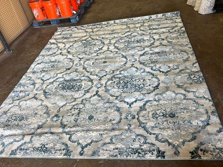 CENTENNO 7’10”x10’ Area RugAmida Blue Sierra Auction Management Inc