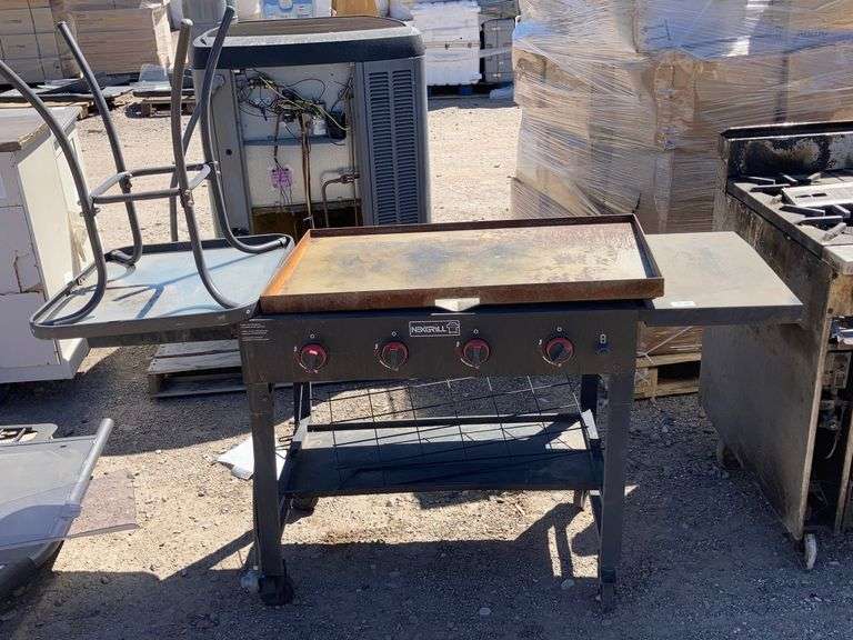 Nexgrill four burner flat top grill, and side table. Sierra Auction