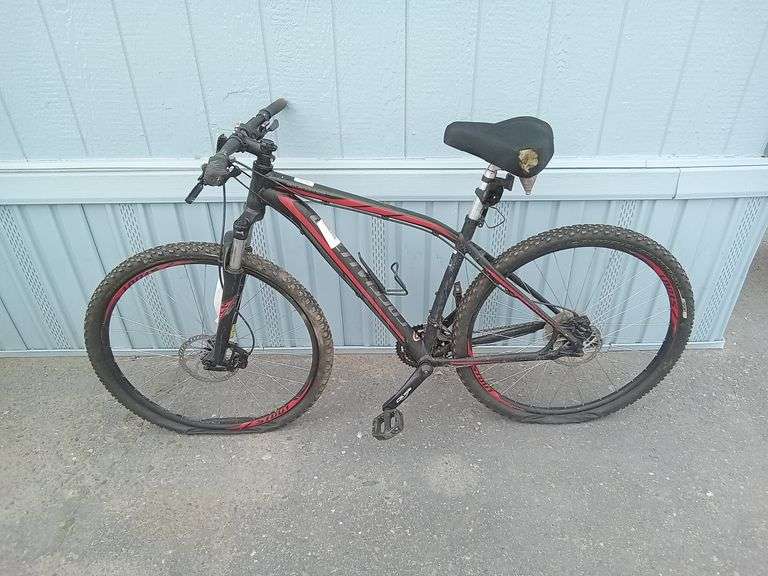 Black and Red Specialized Mountain Bike - Sierra Auction Management Inc