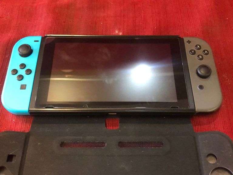 Nintendo Switch With Cover Sierra Auction Management Inc