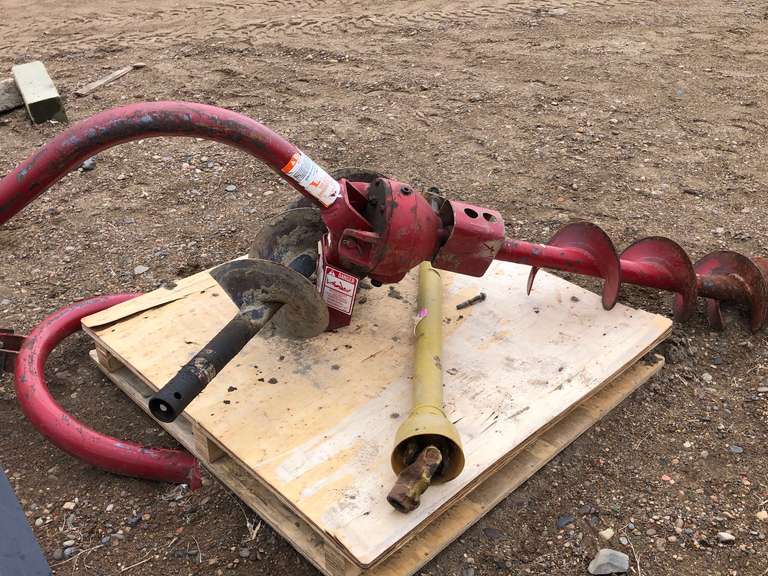 Red TSC 3 pt Post hole digger Smith Sales Co. Auctioneers