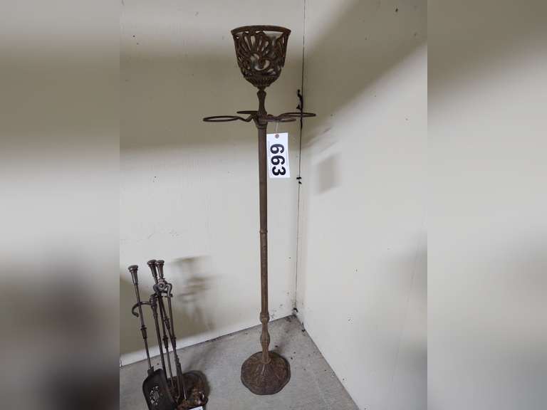 Cast metal outdoor candle holder. 5' tall South Auction