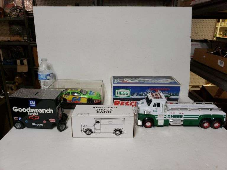 2 Hess Trucks, Visa Diecast Car, Goodwrench Bank And Armored Truck Bank Trice Auctions