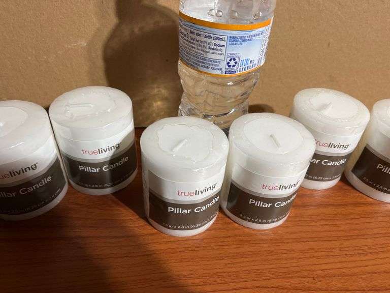6 True Living Pillar Candles Trice Auctions