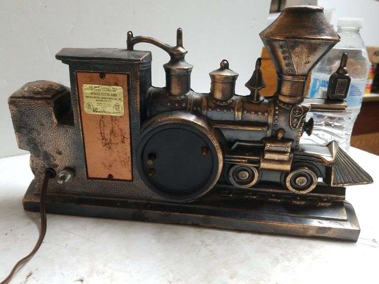 United Clocks Metal Train Clock Trice Auctions