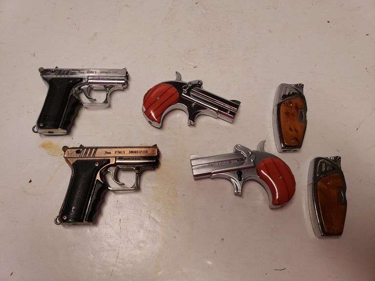 (6) Novelty Lighters Guns Trice Auctions