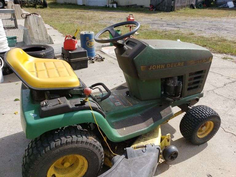 John Deere STX38 Riding Lawn Mower. Runs Trice Auctions