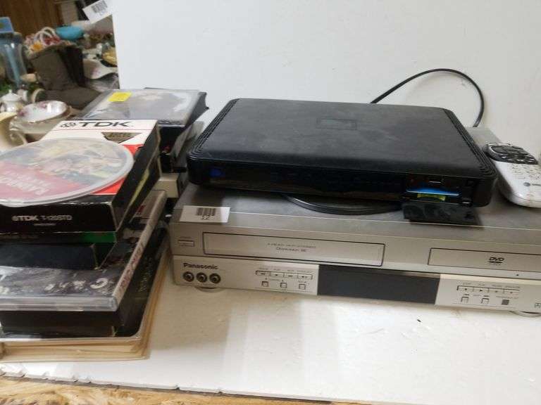 Panasonic VHS/DVD Machine, VHS Tapes, Direct TV Remote, Direct TV Box