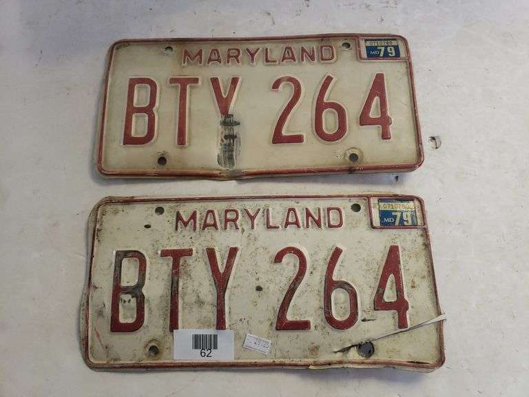 Two Maryland License Plates, One Cracked Trice Auctions