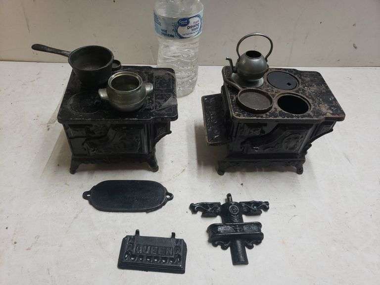 2 Decorative Miniature Metal Stoves One Missing A Leg Trice Auctions