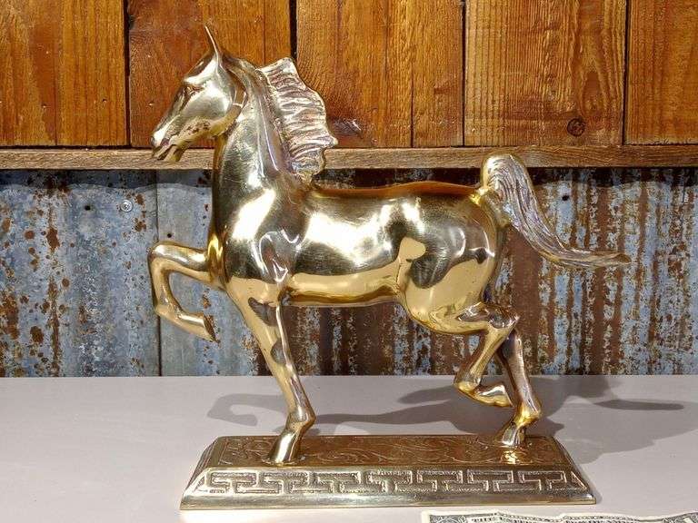 Stunning heavy vintage metal horse sculpture feels solid, believed to be brass nice