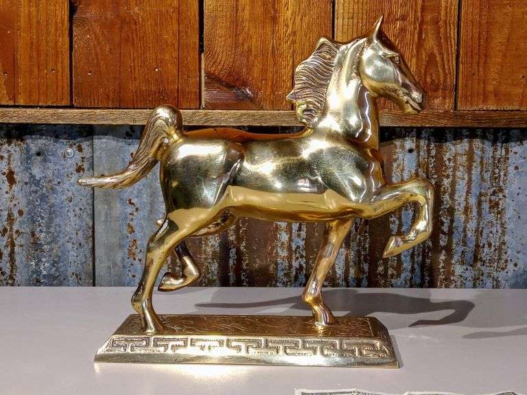 Stunning heavy vintage metal horse sculpture feels solid, believed to be brass nice