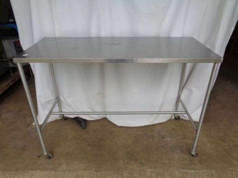 Rolling Stainless Steel Table. 48 x 20 x 34 tall. ( Row 4) Texas