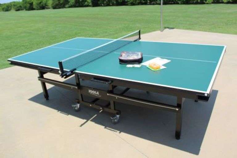 Really nice folding Joola ping pong table with accessories as shown appx 108in long 60in wide