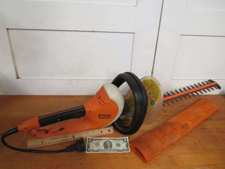 Working Stihl Professional Electric Hedge Trimmer HSE 60 as shown