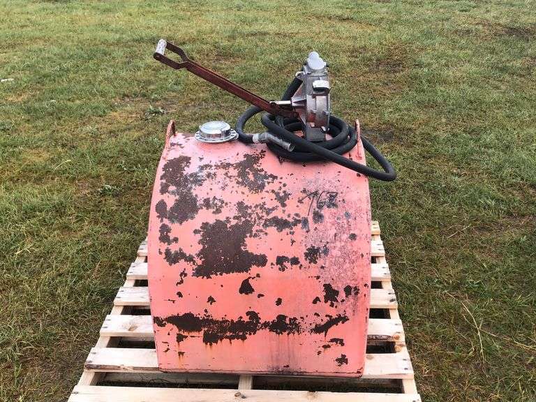 STEEL SLIP FUEL TANK MANUAL PUMP, 100 GALLON. Wild Rose Auction Services