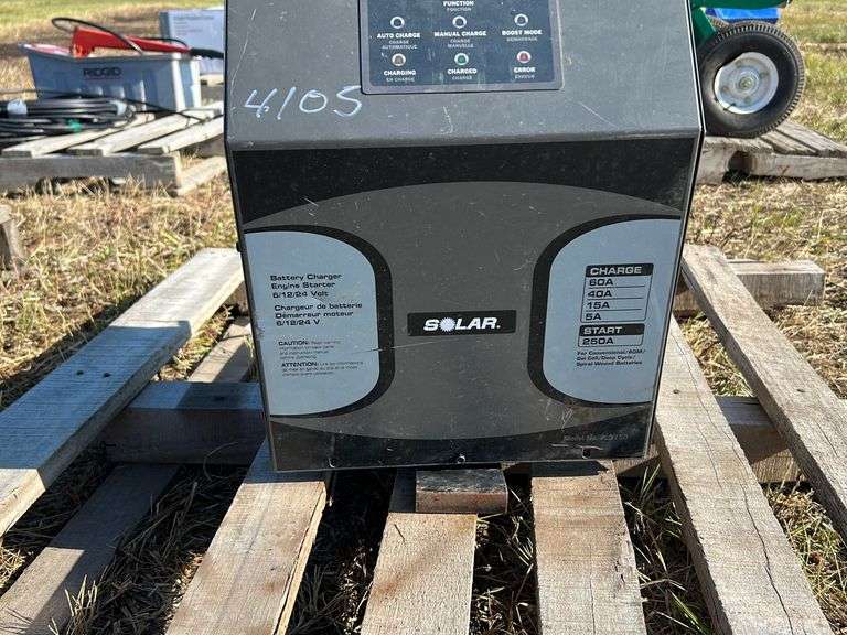 PROLOGIX SOLAR BATTERY CHARGER Wild Rose Auction Services