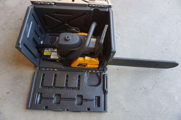 Poulan chainsaw and case World Wide Auction Inc