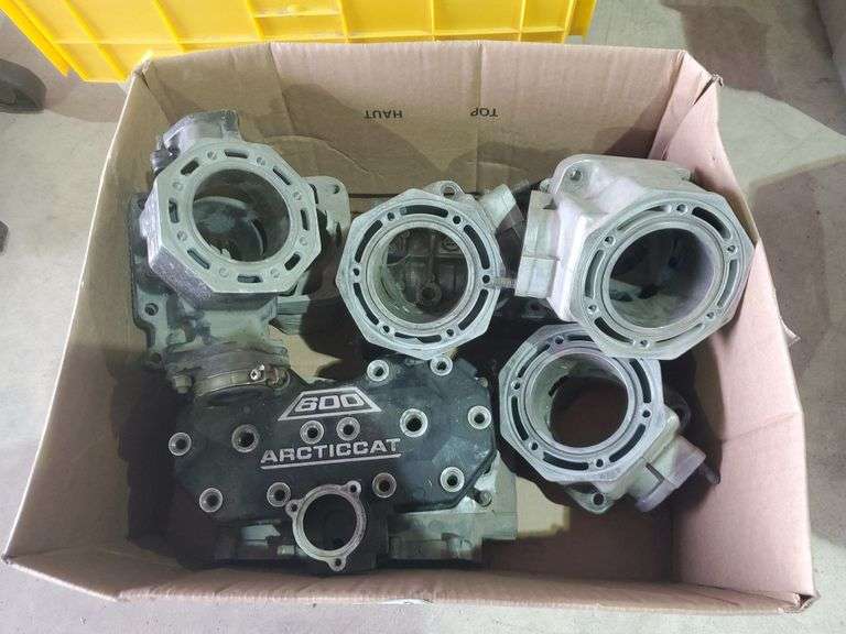 Assorted Arctic Cat cylinder heads Yorkton Auction Centre