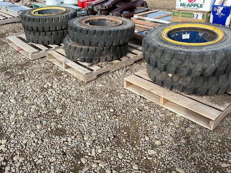 6 Forklift Tires and Rims Semipneumatic Yorkton Auction Centre