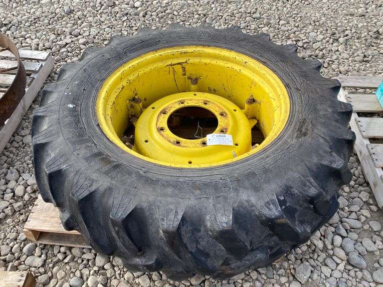 John Deere Front Wheel Assist Tire/Rim Yorkton Auction Centre