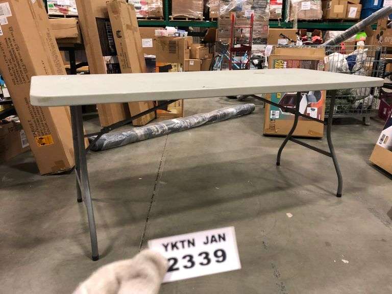 STAPLES BANQUET TABLE WITH FOLDING LEGS Yorkton Auction Centre