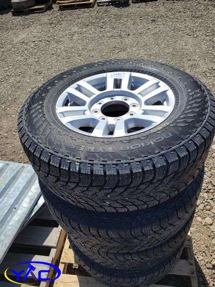 4 - Nokian 275/65R18 Tires and Rims Off '20 F350 - Yorkton Auction Centre