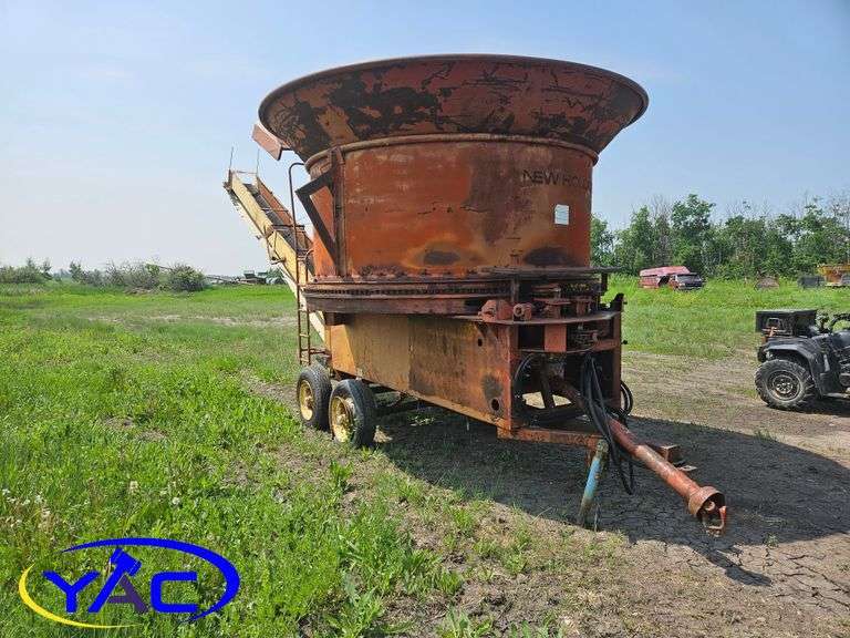 New Holland 379 Tub grinder. 1229 Yorkton Auction Centre